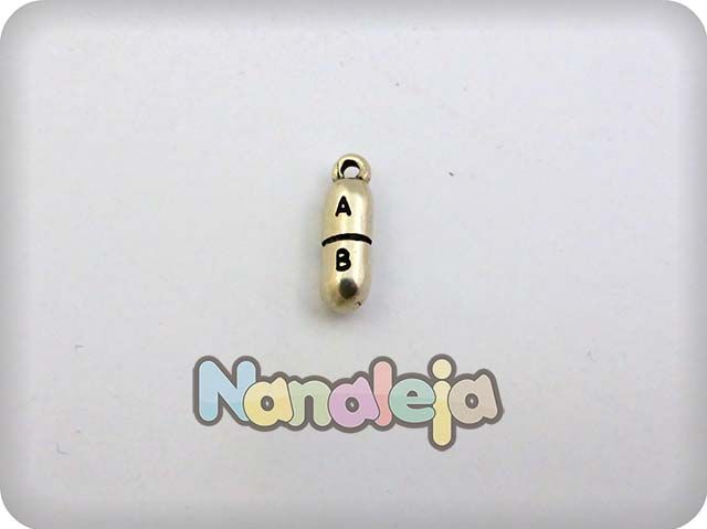 Charm cápsula medicina zamak 18X5mm