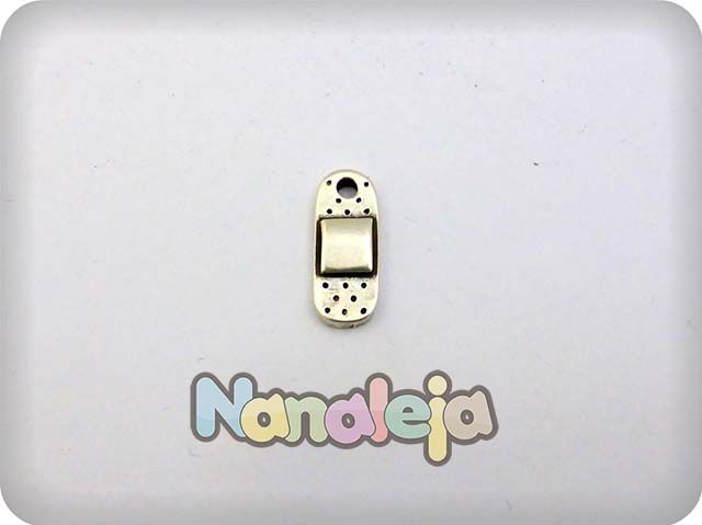 Charm tirita zamak 18X7mm