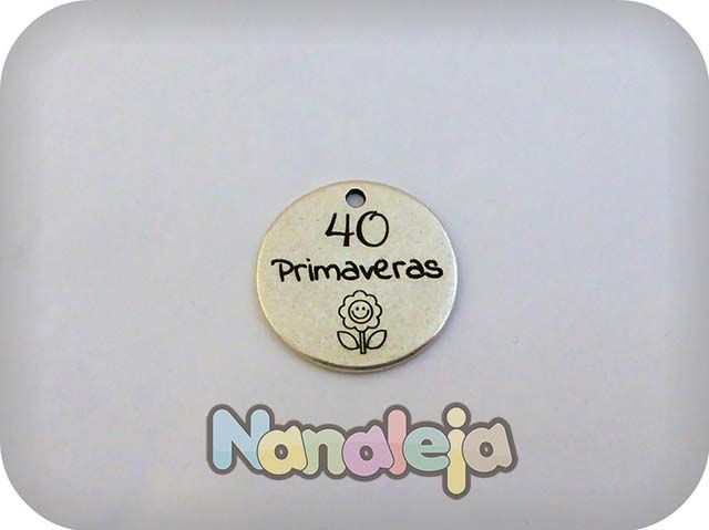 Grabado laser en medalla 23mm con dibujo de zamak 1 Grabado laser en medalla 23mm con dibujo de zamak